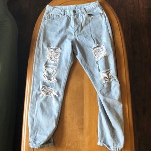 Women’s light wash mom jeans with rips